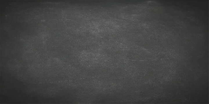 Blank vintage black chalkboard background with a dark gray grunge texture on a rough stone concrete wall surface for a textured design backdrop