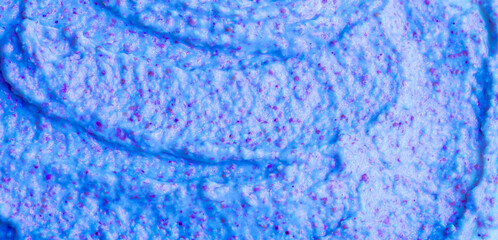 Blue Ice cream from berry yogurt with blueberries and honeysuckle. Smoothie from fresh fruits and...