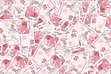 Background of scattered ten Turkish Lira banknotes money texture