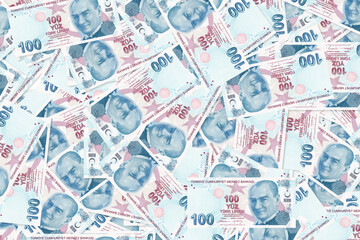 Background of scattered one hundred Turkish Lira banknotes texture
