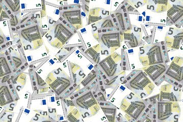 Background of scattered five Euro banknotes money texture