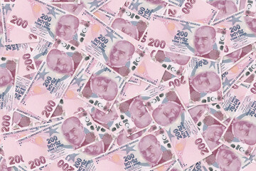 Background of scattered two hundred Turkish Lira banknotes texture