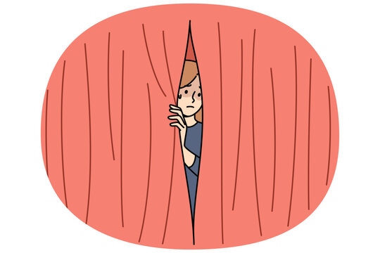 Woman experiences phobia of public speaking and looks out from behind scenes of theater to observe audience. Problem of developing phobia in girl victim of misogyny and gender discrimination at work