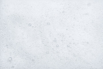 Obraz premium Background of fluffy white detergent foam