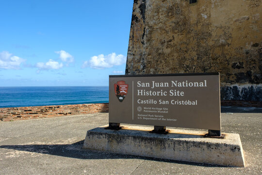 Castillo San Cristobal National Historic Site in San Juan, Puerto Rico sign by the ocean