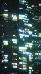 Abstract blurred city lights at night with colorful distortion, bokeh effect, and a futuristic atmosphere.