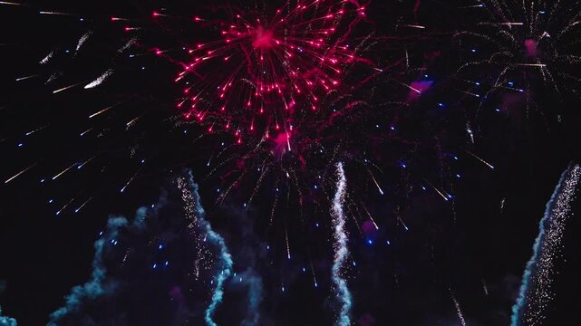 High energy fireworks finale filling the sky with dramatic color bursts 