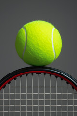 tennis ball and racket