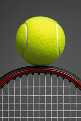 tennis ball and racket