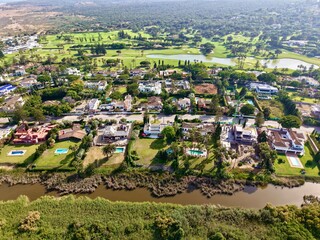 aerial view of the urbanisation and nature around the golf course of Sotogrande, Cadiz, Costa del Sol, Andalusia, Spain © keBu.Medien