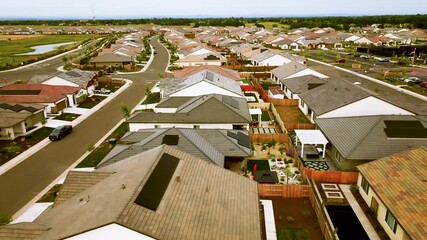 aerial view of a Roseville, California middle class brand new residential houses neighborhood in a city suburbs. suburbia