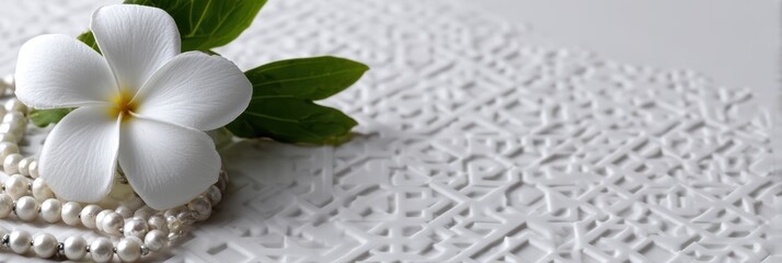 luxury branding, sleek, high-end header with white-on-white d embossed islamic pattern, silver prayer bead, and jasmine flower professional and commercial