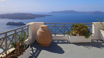 Panorama  from Oia slopes with cruise ship in background