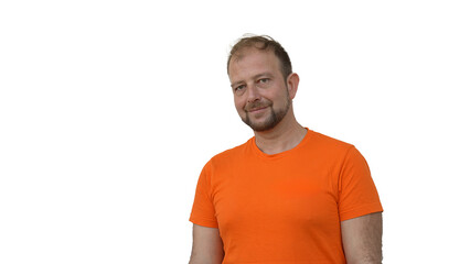Portrait of a proud professional male employee standing against clean white backdrop