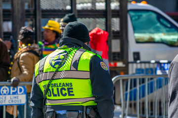 New Orleans, LA - February 9, 2016: Street view of New Orleans showing police presence during lively Mardi Gras event © jovannig