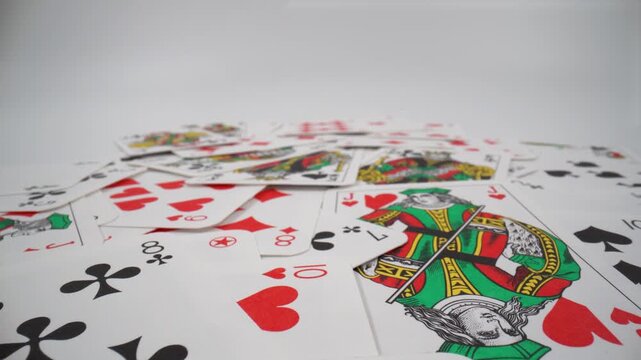 Close up of playing cards on a white background