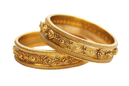 Golden bangles with intricate designs on transparent&nbsp;background