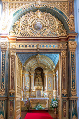 Fototapeta premium Jesus Christ crucified inside the church of Bom Jesus in the parish of Rabo de Peixe, São Miguel, Azores, Portugal.