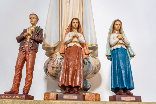 Statue representing Our Lady of Fatima with the three shepherd children, Francisco Marto, Lucia and Jacinta.