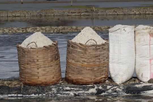 stack of salt in a wooden basket