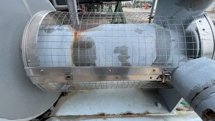 Steel grid used to make protective covers for high heat equipment to prevent danger from contact.