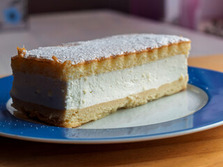 Delicious Creamy Vanilla Cake Slice on Plate