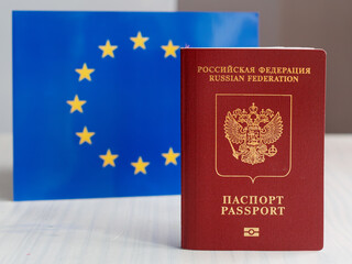 Russian Passport Displayed Against European Union Flag