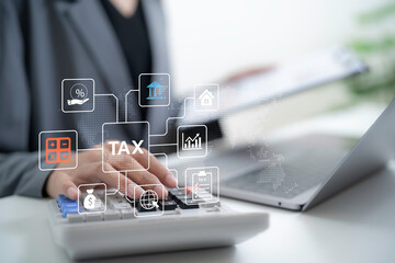 Business professional using calculator with digital tax interface showing financial planning accounting analysis online taxation system and corporate finance management