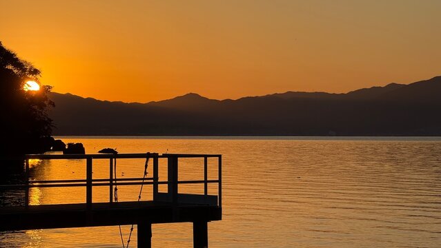 Serene sunset landscape over the calm waters of Lake Biwa