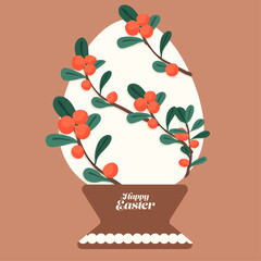 Easter egg decorated with berry branches