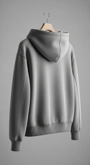 Hoodie jacket mockup hanging naturally on a wooden hanger, modern studio setting, plain neutral background