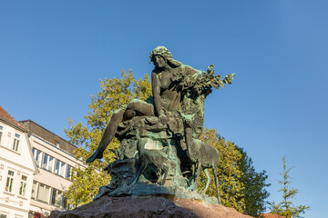 Obraz premium Donop fountain in Detmold at market square by artist Meister Hölbe in 1902.