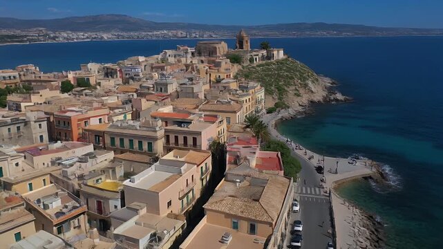 Aerial view of Syracuse, Italy, showcasing historic architecture and coastal scenery on a sunny day
