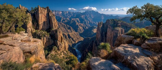 Panoramic vista of a vast canyon with a winding river and cliffs