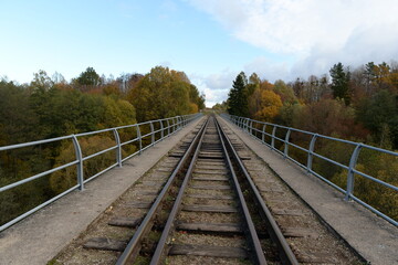 Fototapeta premium The old railway on the arch bridge over the Krasnaya River in the Kaliningrad region