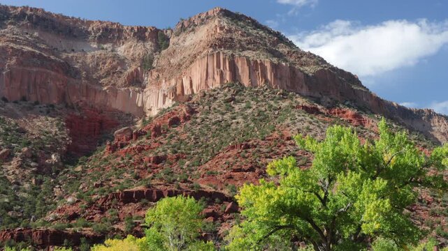 Steep cliffs and large cottonwoods and aspens line the gorgeous Jemez Mountain Trail National Scenic Byway in northern New Mexico