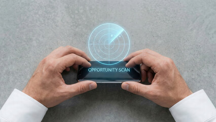Business hand smartphone radar high level planning focus opportunity scan concept
