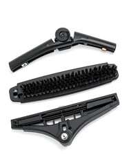 Fototapeta premium Three disassembled black tool parts laid out on a white surface