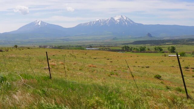 Landscape view of Colorado&rsquo;s Spanish Peaks, two freestanding mountains that are not part of any range, on a blustery spring day