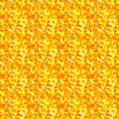Vibrant, seamless abstract pattern with warm yellow and orange organic shapes for modern design projects.