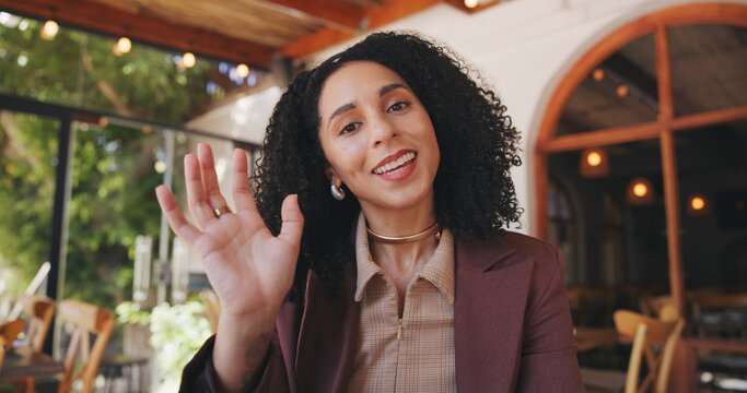 Businesswoman, portrait and wave in cafe for video call, online meeting and remote work opportunity. Female freelancer, POV and greeting in restaurant for welcome, virtual interview and introduction
