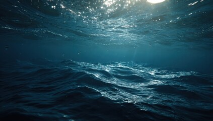 Underwater ocean scene. Sunlight shining through waves