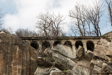 Old ruins in the rocks with sky and clouds on Markovo tepe. Plovdiv