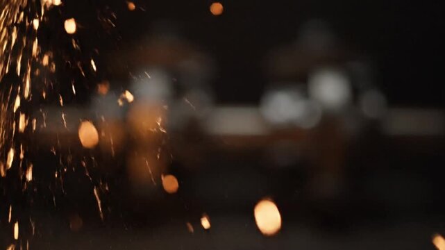 cinematic macro shot of bright orange sparks from metalworking flying slowly through air glowing molten particles realistic motion blur dark industrial environment implied soft bokeh sparks high contr
