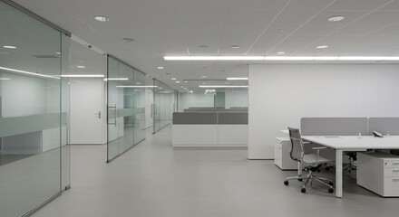 Modern, minimalist office space with open layout.  Clean lines and bright lighting