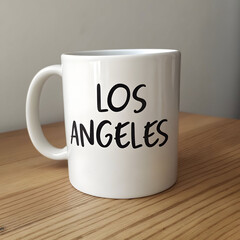 a white coffee mug with the word los angeles