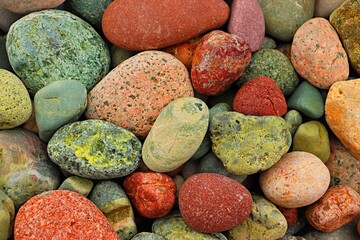 Background, texture of sea pebbles on the beach