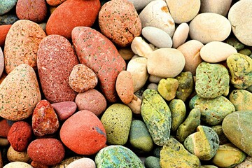 Background, texture of sea pebbles on the beach