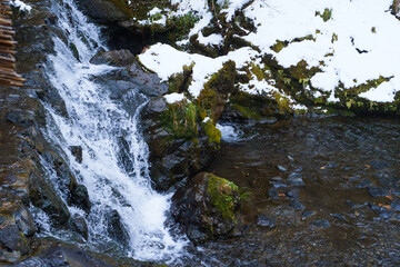 Winter scenery of Kyoto, piled up snow and waterfall