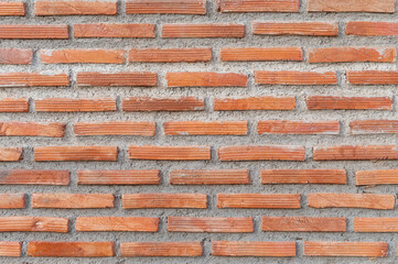 Red brick wall texture forming classic architectural background